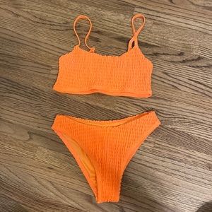 Orange Mosmann swimsuit. Size Small. Never worn
